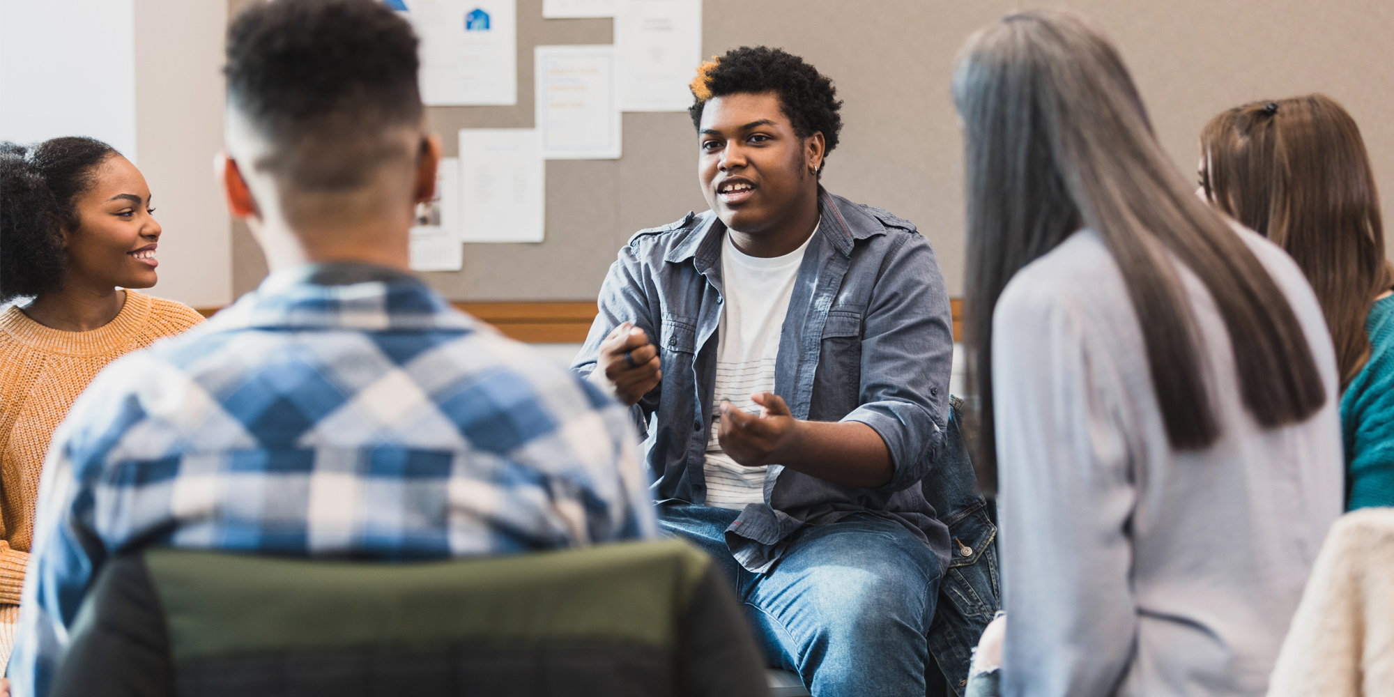 Group of adults in a discussion.