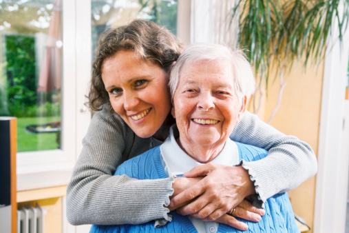 Daughter hugging Mother